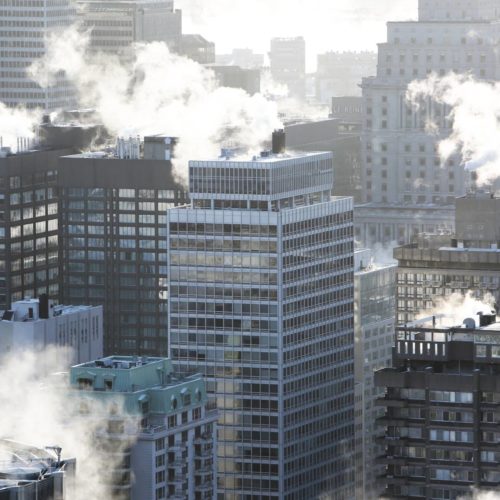 city skyline with steam