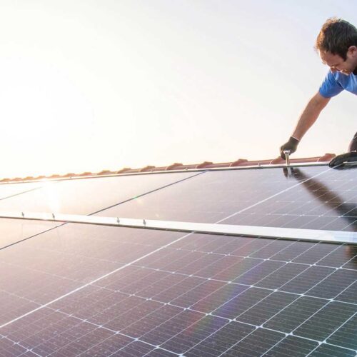 working on solar panels