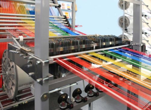 multi-colored yarn threads spun from machine